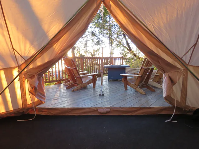 Glamping Pad – View from inside the tent across the deck to the water